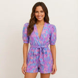 Short jumpsuit for women with V-neck and adjustable belt