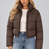 Chaqueta acolchada recortada para mujer con bolsillos con cremallera y cuello alto
