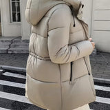 Abrigo acolchado largo con capucha para mujer, con cintura ajustable y bolsillos